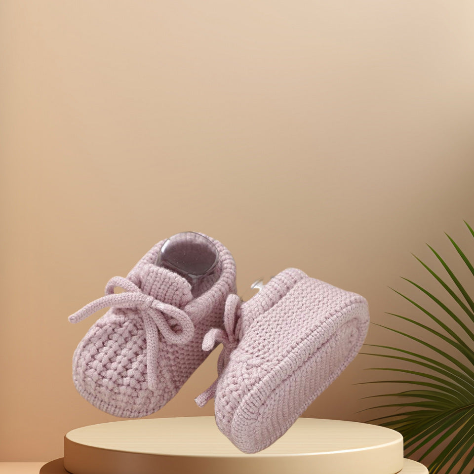 A collection of best-selling baby products including soft clothing, cozy blankets, adorable accessories, engaging toys, and gentle care essentials.