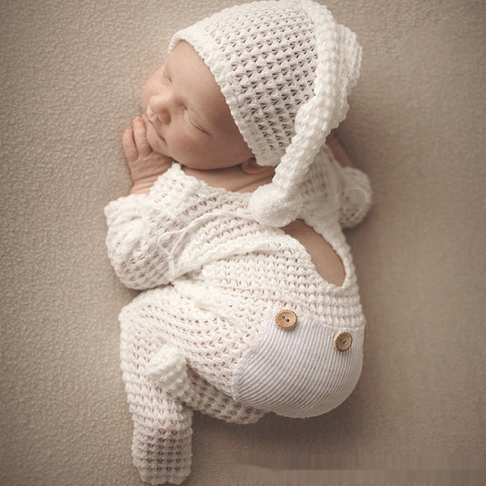 Mother gently holding a smiling baby wrapped in a soft blanket, representing safe, gentle, and caring baby skincare and comfort products.