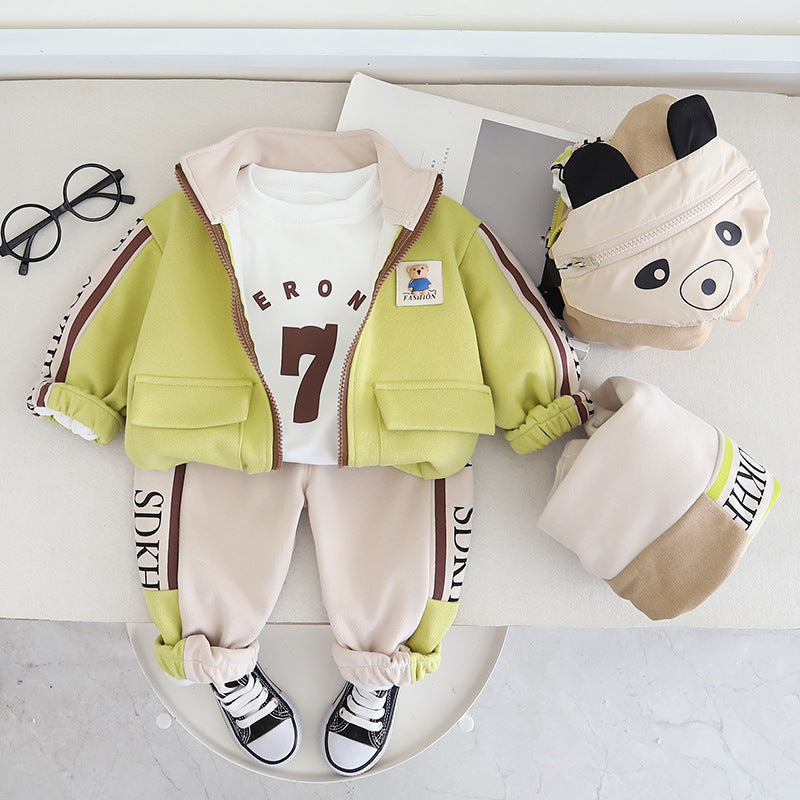 A pastel flat lay featuring a handwritten list of baby girl names, soft baby clothes, pink flowers, and a plush toy, evoking warmth and joy.