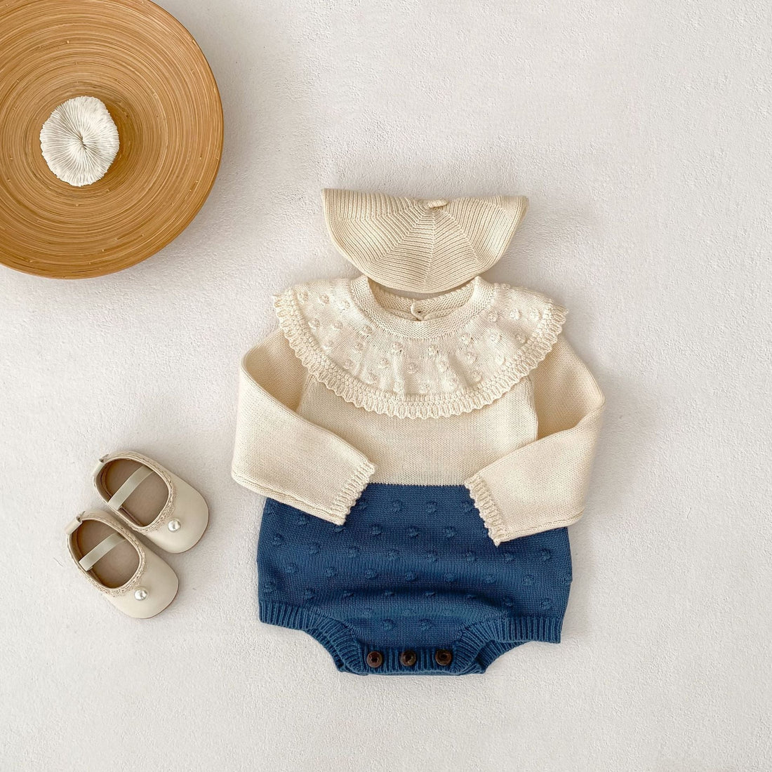A serene nursery with a modern crib, cozy rocking chair, soft rug, gentle lighting, and playful storage baskets, creating a safe, dreamy space for baby.
