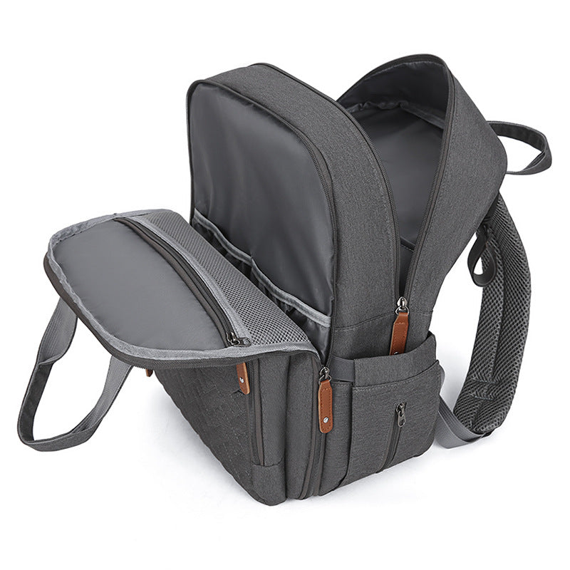 Sac à langer multifonctionnel avec matelas à langer et compartiment chauffant
