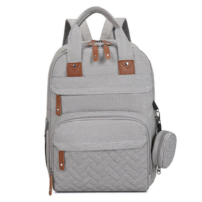 Sac à langer multifonctionnel avec matelas à langer et compartiment chauffant