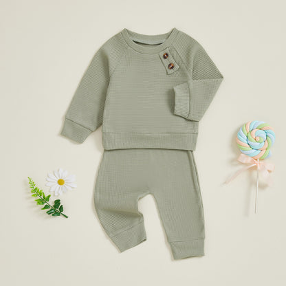 Ensemble haut et pantalon de bébé de couleur unie