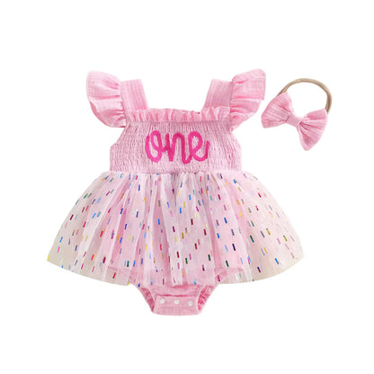 Barboteuse en maille pour filles et bébés avec une jupe en tulle et un nœud