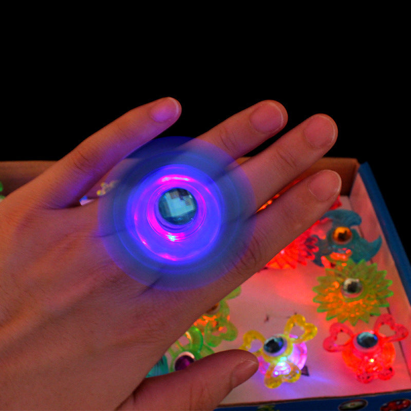 Children's luminous toy top finger light