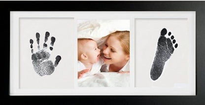Baby hands and feet with oil