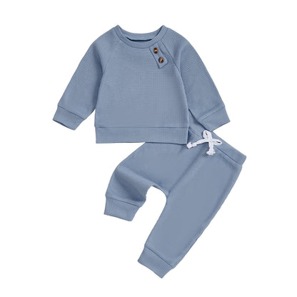 Ensemble haut et pantalon de bébé de couleur unie
