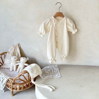 Barboteuse une pièce longue avec une seule rangée de boutons-pression pour bébés