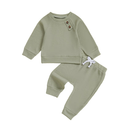 Ensemble haut et pantalon de bébé de couleur unie