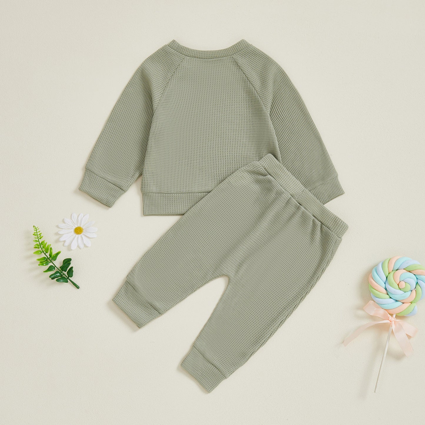 Ensemble haut et pantalon de bébé de couleur unie