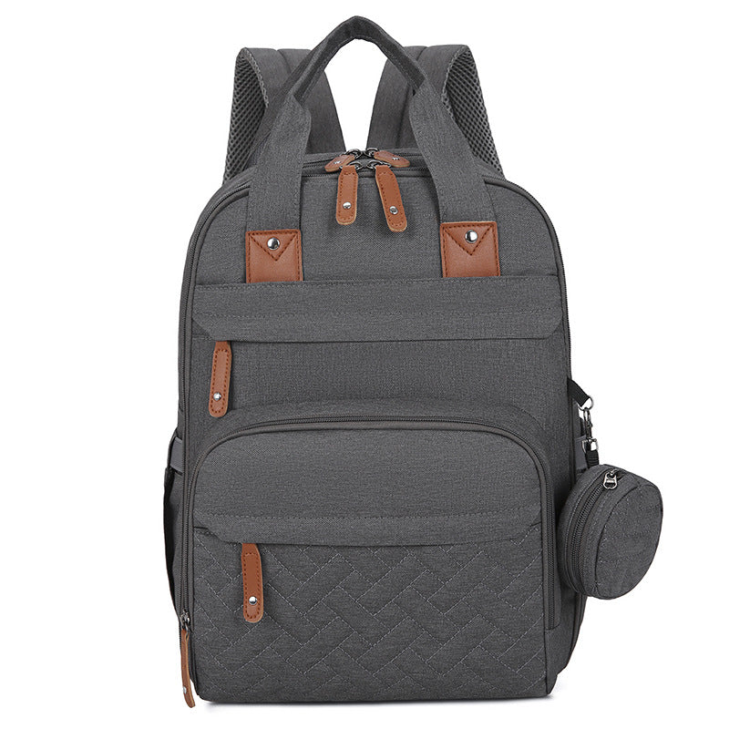 Sac à langer multifonctionnel avec matelas à langer et compartiment chauffant