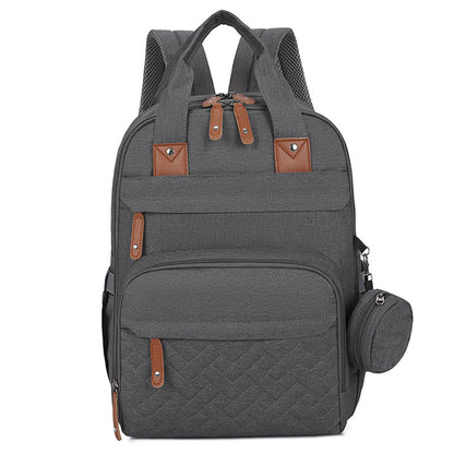 Sac à langer multifonctionnel avec matelas à langer et compartiment chauffant