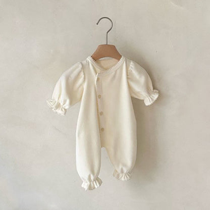 Barboteuse une pièce longue avec une seule rangée de boutons-pression pour bébés