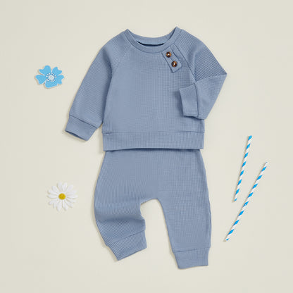 Ensemble haut et pantalon de bébé de couleur unie