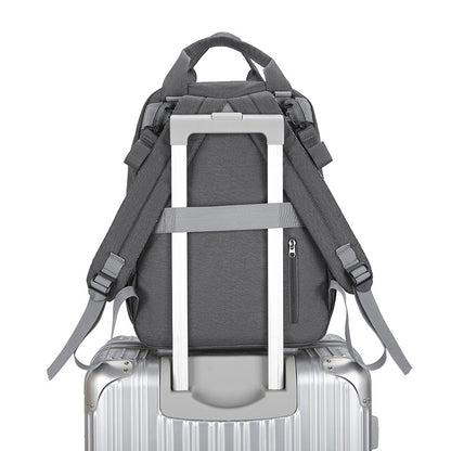 Sac à langer multifonctionnel avec matelas à langer et compartiment chauffant